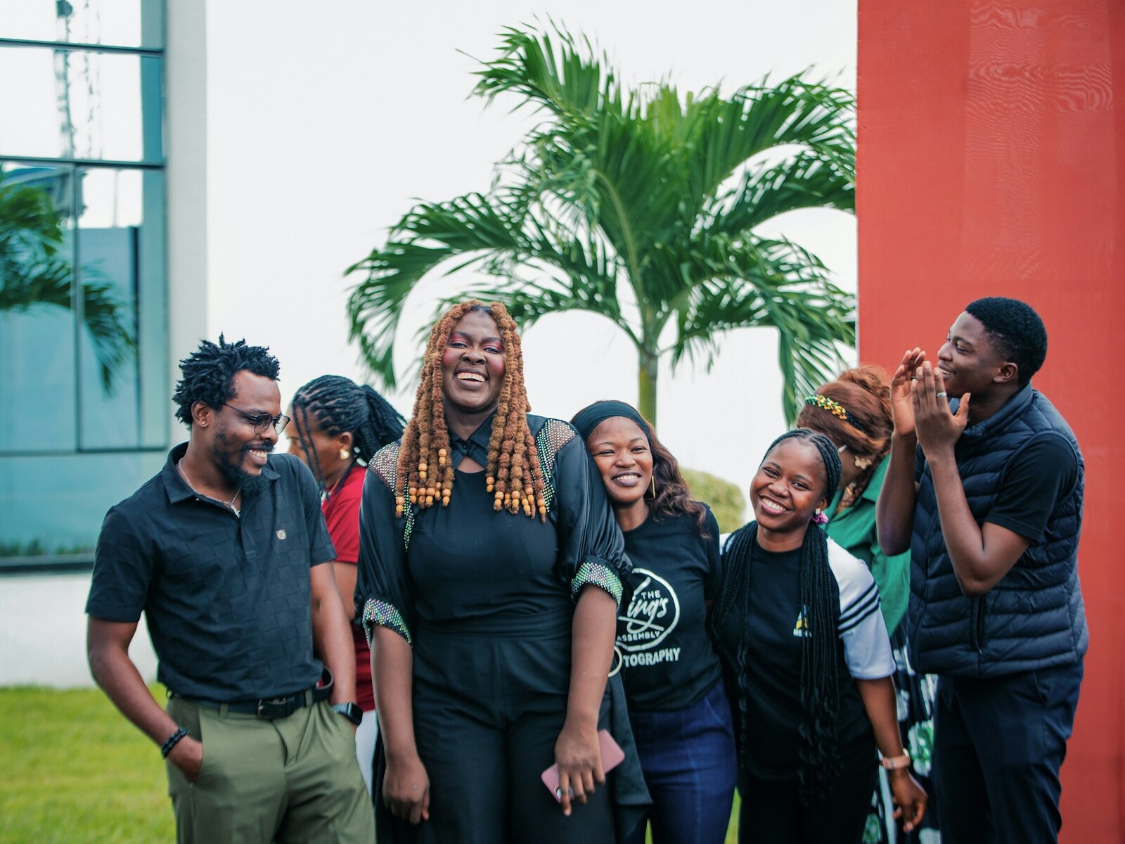 A group of friends laughing together outdoors